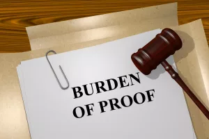 A Paper That Says &Quot;Burden Of Proof&Quot; And A Gavel.