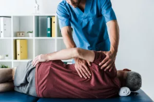 Chiropractor In Plano Tx Giving Treatment To A Personal Injury Victim