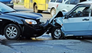 Two Severely Damaged Vehicles After A Head-On Collision In Texas, Highlighting The Need For The Best Mansfield Personal Injury Lawyer To Help Victims Pursue Compensation.