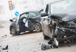 Severely Damaged Vehicles After A Two-Car Collision At An Intersection, Highlighting The Need For A Lancaster Car Accident Lawyer To Help Injured Victims Recover Compensation.