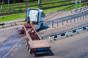 Image Of A Jackknifed Truck Blocking A Road, Illustrating The Dangers Of Large Truck Accidents. Dallas Jackknife Truck Accident Lawyer Can Help Victims Seek Compensation.