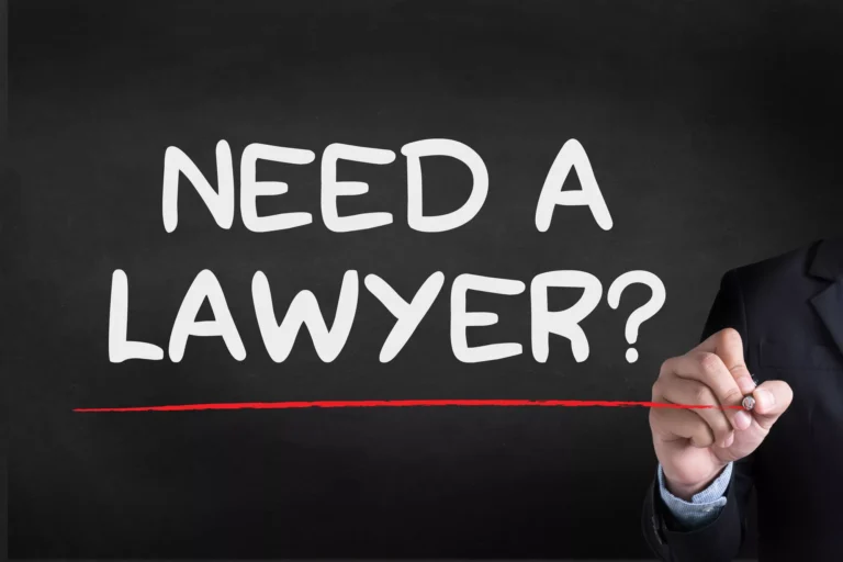 Need A Lawyer? Text On A Blackboard With A Person In A Suit Drawing A Red Underline. Learn How Can A Truck Accident Lawyer Help With Your Case.