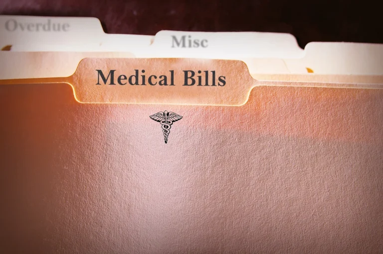 A File Folder Labeled &Quot;Medical Bills&Quot; With Tabs For Overdue And Miscellaneous Expenses, Representing Questions About Who Pays For Medical Bills After A Car Accident.