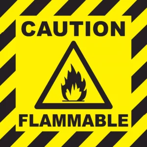 Caution Sign With Flammable Symbol Warning Of Fire Hazard, Representing Dangerous Conditions That May Lead To Serious Burns—Dallas Burn Injury Lawyer Can Help Victims Seek Compensation For Such Incidents.