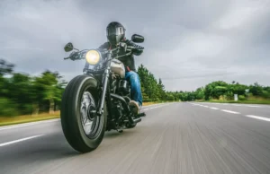 Motorcycle Rider Cruising On Open Highway Near Lancaster Tx Before A Potential Crash—Consult A Lancaster Motorcycle Accident Lawyer For Legal Help.