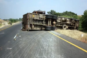Overturned 18-Wheeler Blocking A Rural Highway In Mansfield, Illustrating A Severe Mansfield Truck Accident Scene Without Any Visible People.
