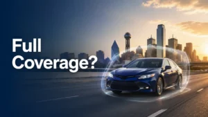 Blue Car Protected By A Transparent Shield On A Dallas Highway, Illustrating What Is Full Coverage Car Insurance.